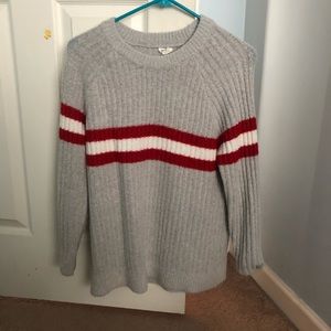 Gray sweater with red and white stripes
